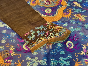 A Chinese blue-ground embroidered silk 'Dragon' robe, 'Ji Fu' 吉服, 19th C.