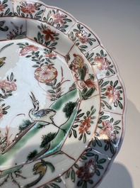 Three sets of Chinese famille verte cups and saucers with birds and flowers, various marks, Kangxi