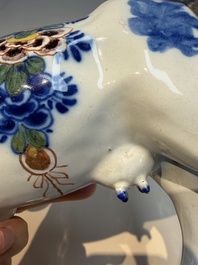 A pair of polychrome Dutch Delft cows, 18th C.