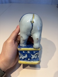 A pair of blue, white and yellow Frankfurt faience models of elephants, ca. 1700