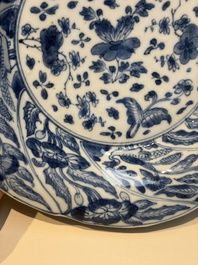 Four Chinese blue and white moulded plates with floral design, Kangxi