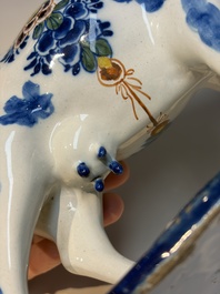 A pair of polychrome Dutch Delft cows, 18th C.