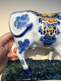A pair of polychrome Dutch Delft cows, 18th C.