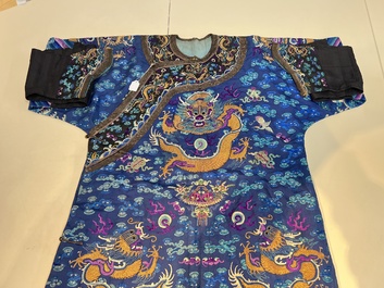 A Chinese blue-ground embroidered silk 'Dragon' robe, 'Ji Fu' 吉服, 19th C.