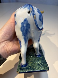 A pair of polychrome Dutch Delft cows, 18th C.
