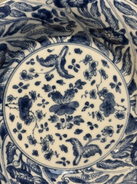 Four Chinese blue and white moulded plates with floral design, Kangxi