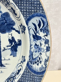 A massive Chinese blue and white 'Music-Making Scholars' dish, Yongzheng