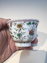 Three sets of Chinese famille verte cups and saucers with birds and flowers, various marks, Kangxi