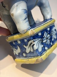A pair of blue, white and yellow Frankfurt faience models of elephants, ca. 1700