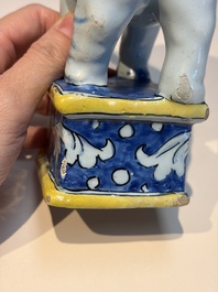 A pair of blue, white and yellow Frankfurt faience models of elephants, ca. 1700