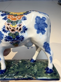 A pair of polychrome Dutch Delft cows, 18th C.