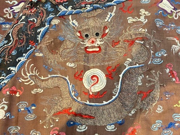 A Chinese brown-ground embroidered silk 'Dragon' robe, 'Ji Fu' 吉服, 19th C.