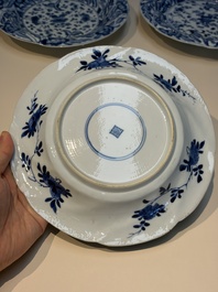 Four Chinese blue and white moulded plates with floral design, Kangxi
