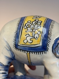 A pair of blue, white and yellow Frankfurt faience models of elephants, ca. 1700