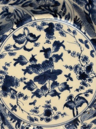 Four Chinese blue and white moulded plates with floral design, Kangxi