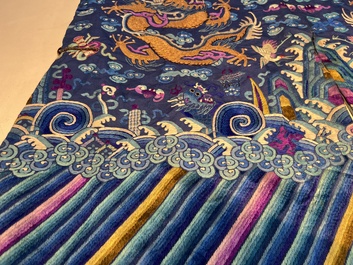 A Chinese blue-ground embroidered silk 'Dragon' robe, 'Ji Fu' 吉服, 19th C.