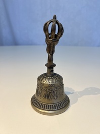 Three Tibetan bronze ritual bells and a bronze Buddha, 19th C.