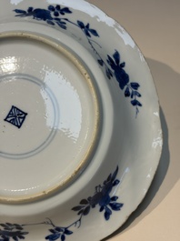 Four Chinese blue and white moulded plates with floral design, Kangxi
