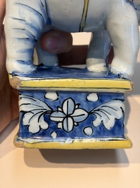 A pair of blue, white and yellow Frankfurt faience models of elephants, ca. 1700