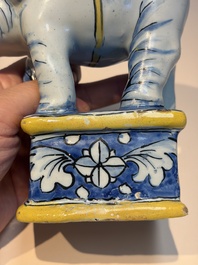 A pair of blue, white and yellow Frankfurt faience models of elephants, ca. 1700