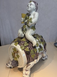 A massive polychrome Brussels faience 'Bacchus on a Barrel' fountain, 18th C.