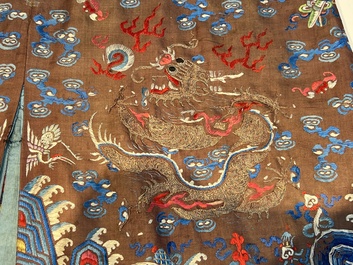 A Chinese brown-ground embroidered silk 'Dragon' robe, 'Ji Fu' 吉服, 19th C.