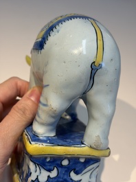 A pair of blue, white and yellow Frankfurt faience models of elephants, ca. 1700