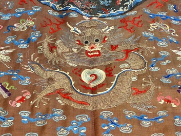 A Chinese brown-ground embroidered silk 'Dragon' robe, 'Ji Fu' 吉服, 19th C.