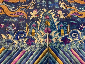 A Chinese blue-ground embroidered silk 'Dragon' robe, 'Ji Fu' 吉服, 19th C.