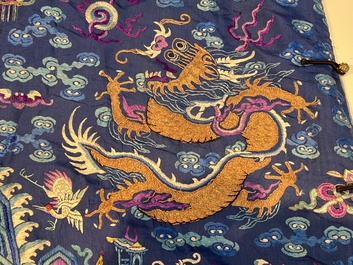 A Chinese blue-ground embroidered silk 'Dragon' robe, 'Ji Fu' 吉服, 19th C.