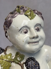 A massive polychrome Brussels faience 'Bacchus on a Barrel' fountain, 18th C.