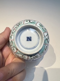 Three sets of Chinese famille verte cups and saucers with birds and flowers, various marks, Kangxi