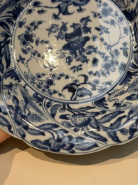 Four Chinese blue and white moulded plates with floral design, Kangxi