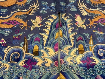 A Chinese blue-ground embroidered silk 'Dragon' robe, 'Ji Fu' 吉服, 19th C.
