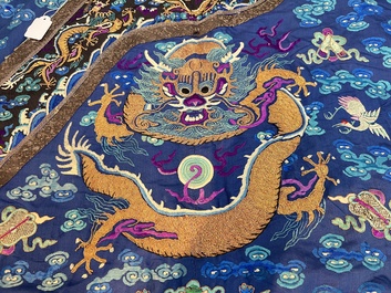 A Chinese blue-ground embroidered silk 'Dragon' robe, 'Ji Fu' 吉服, 19th C.