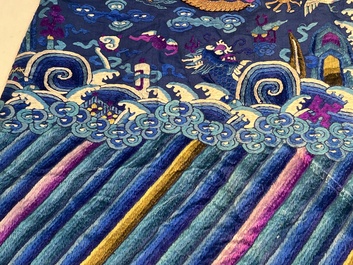 A Chinese blue-ground embroidered silk 'Dragon' robe, 'Ji Fu' 吉服, 19th C.