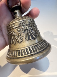 Three Tibetan bronze ritual bells and a bronze Buddha, 19th C.
