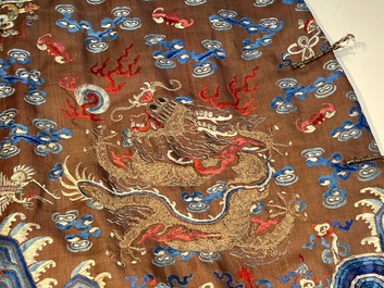 A Chinese brown-ground embroidered silk 'Dragon' robe, 'Ji Fu' 吉服, 19th C.