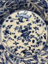 Four Chinese blue and white moulded plates with floral design, Kangxi