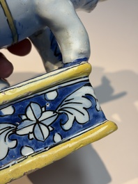 A pair of blue, white and yellow Frankfurt faience models of elephants, ca. 1700