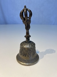 Three Tibetan bronze ritual bells and a bronze Buddha, 19th C.