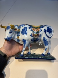 A pair of polychrome Dutch Delft cows, 18th C.