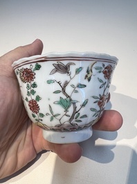 Three sets of Chinese famille verte cups and saucers with birds and flowers, various marks, Kangxi
