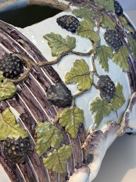 A massive polychrome Brussels faience 'Bacchus on a Barrel' fountain, 18th C.