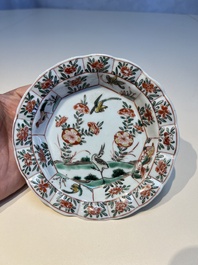 Three sets of Chinese famille verte cups and saucers with birds and flowers, various marks, Kangxi