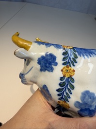 A pair of polychrome Dutch Delft cows, 18th C.