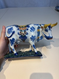 A pair of polychrome Dutch Delft cows, 18th C.