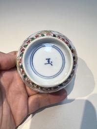 Three sets of Chinese famille verte cups and saucers with birds and flowers, various marks, Kangxi