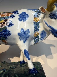 A pair of polychrome Dutch Delft cows, 18th C.