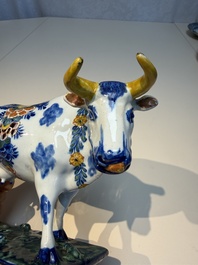 A pair of polychrome Dutch Delft cows, 18th C.